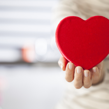 Woman holding heart